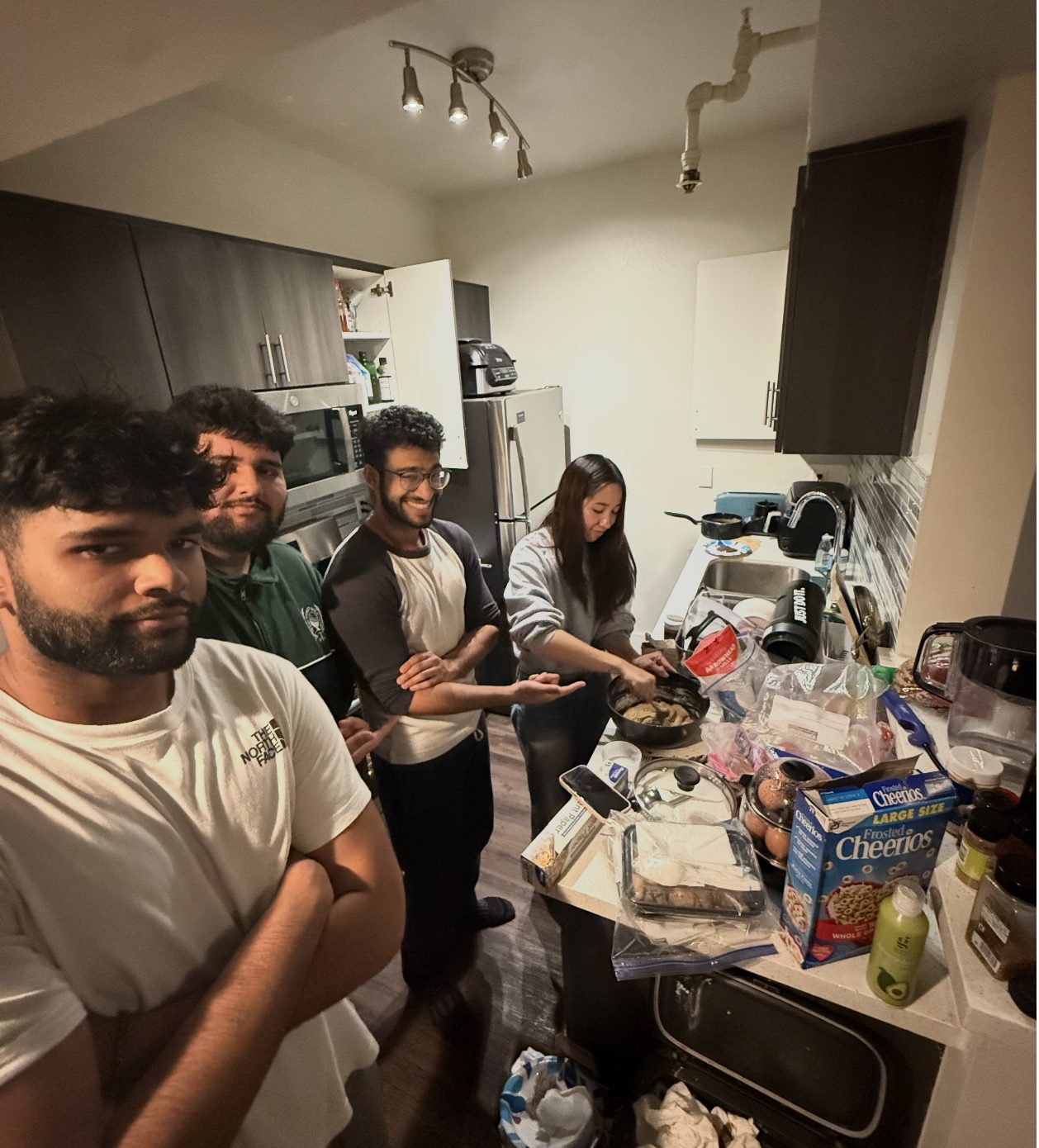 Zaid cooking with friends